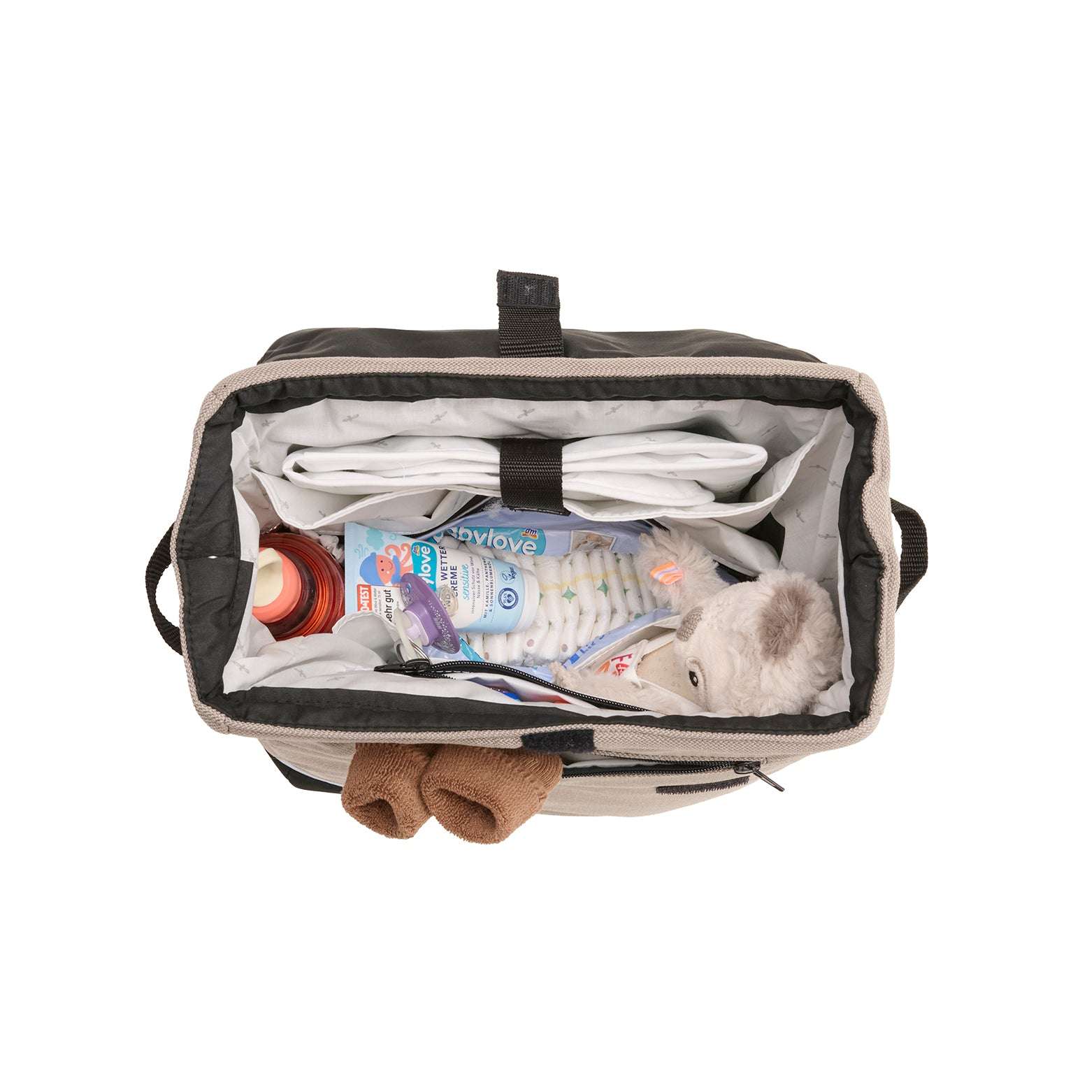 Offene Flexi Bag Outdoor mit Windeln, Cremes, Schnullern, Stofftuch, Plüschtier und Handtuch im Hauptfach
