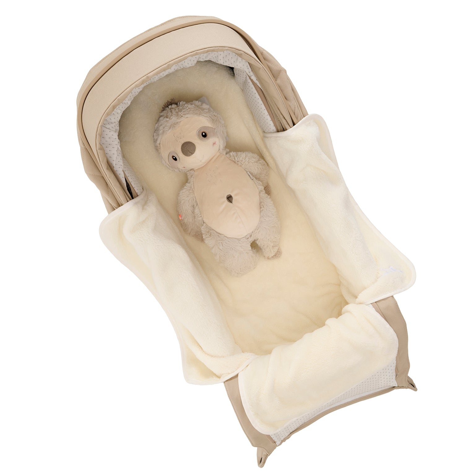 Vielseitiges Kuschel-Inlay aus weichem  Soft-Material.
In der Falttasche, Inlay geöffnet.
Schräge Draufsicht.