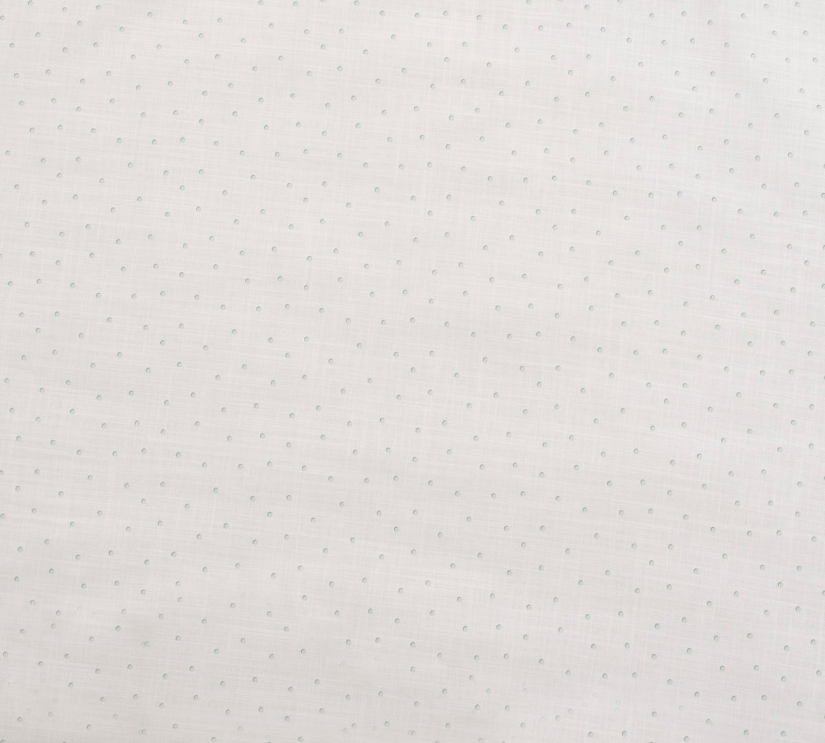 Weiße Kombitasche mit feinem Rastermuster und kleinen hellgrünen Punkten, textiler Stoff im Nahaufnahme-Detailbild